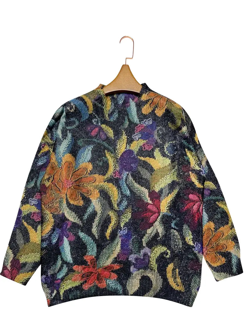 Quinta trui: artistieke elegantie en vintage charme. Met een gobelin-geïnspireerd bloemenmotief voegt het verfijning en textuur toe aan je casual garderobe. Ideaal voor koelere dagen, casual uitjes of geklede gelegenheden. Zachte pasvorm en veelzijdig te combineren met jeans, broeken of rokken. Verkrijgbaar in zwart, maten S-2XL. Voeg een vleugje kunstzinnige charme toe aan je stijl met Quinta. Bestel nu en geniet van tijdloze elegantie en comfort!