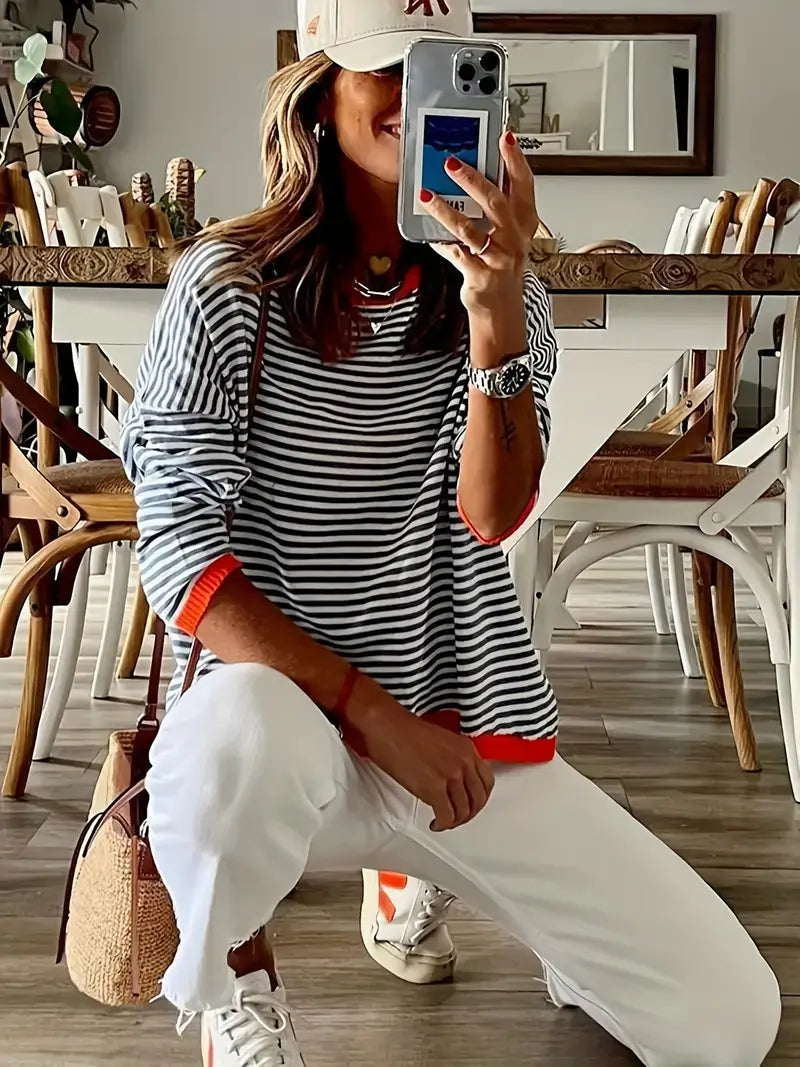 Genimah lichtgewicht trui met dunne strepen en een comfortabele pasvorm, perfect voor een casual en stijlvolle look. Gemaakt van ademend polyester voor langdurig draagcomfort. De levendige oranje tint voegt een frisse en modieuze touch toe aan elke outfit. Ideaal voor dagelijks gebruik en makkelijk te combineren. Verkrijgbaar in maten XS-2XL. Upgrade je garderobe met Genimah en geniet van moeiteloze stijl en comfort. Bestel nu en voeg kleur toe aan je look!