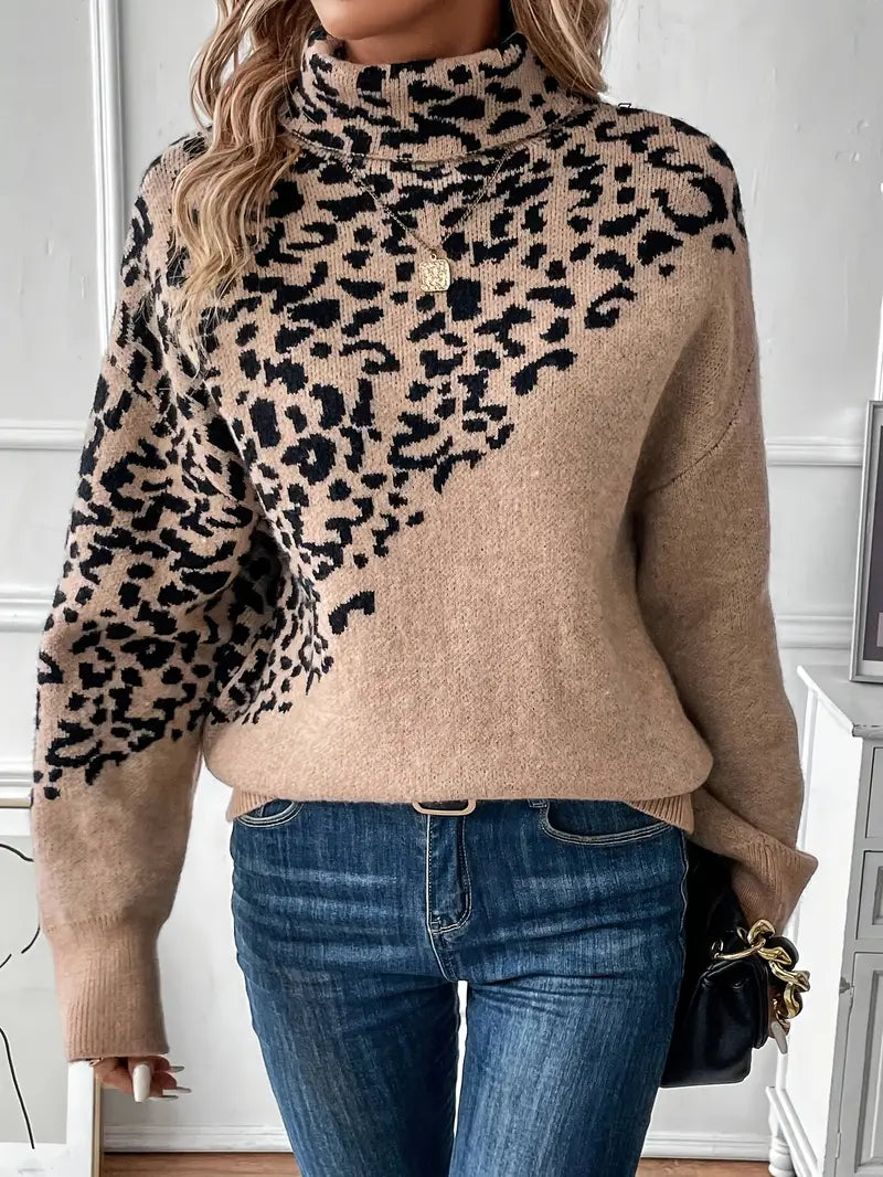 Noemi turtlenecktrui met luipaardprint – een trendy en comfortabele must-have voor de koelere maanden. Met een relaxed fit, zachte textuur en uniek patroon biedt deze trui ultieme warmte en stijl. Perfect voor casual dagen, gezellige weekenden of als statementstuk in je outfit. Combineer moeiteloos met jeans, leggings of rokken. Verkrijgbaar in khaki, maten S-XL. Voeg gedurfde elegantie en comfort toe aan je garderobe met de Noemi. Bestel nu!