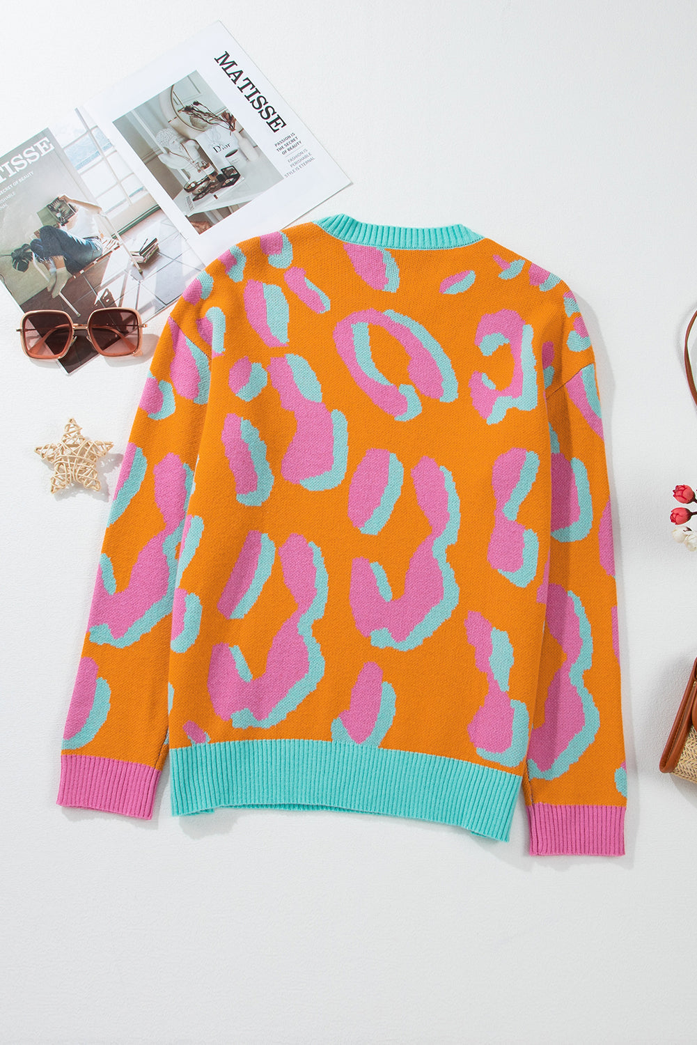 Everly | Kleurrijke gebreide damestrui met luipaardprint in oranje, roze en groen