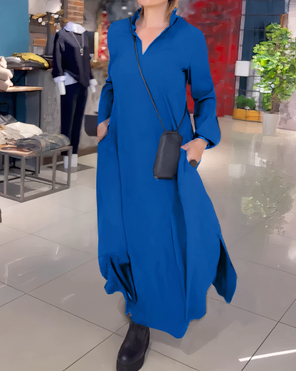 Rimke jurk – moeiteloze elegantie en ultiem comfort in één. Met lange mouwen, een losse pasvorm en subtiele zijsplitten is deze jurk perfect voor elke gelegenheid. Verkrijgbaar in zwart, bordeauxrood, blauw, bruin en groen, in maten S-3XL. Gemaakt van hoogwaardig polyester voor een luxueuze uitstraling. Combineer stijl en gemak met deze veelzijdige must-have. Bestel nu en upgrade je garderobe met de perfecte mix van comfort en verfijning!