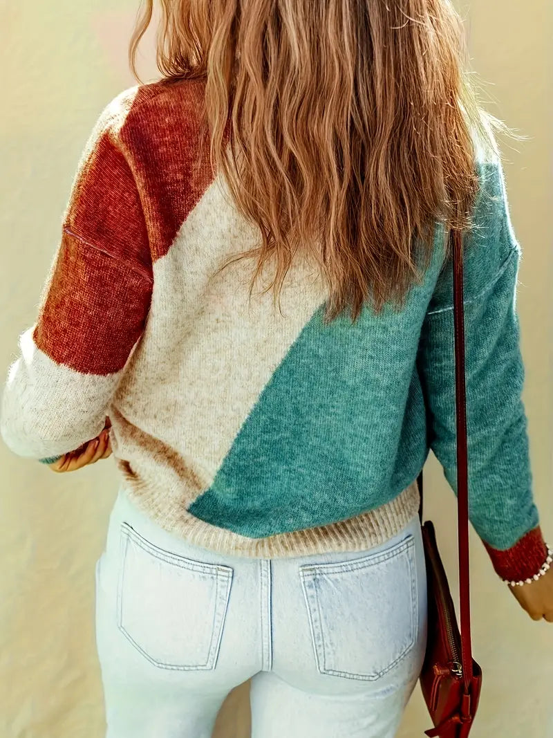 Soleil colorblock sweater – een opvallende en stijlvolle toevoeging aan je garderobe. Met een uniek ontwerp in aardetinten en een zachte, cozy pasvorm biedt deze trui comfort en warmte. Perfect voor casual uitjes, koffieafspraken of weekendavonturen. Combineer eenvoudig met jeans, leggings of rokken voor een trendy look. Verkrijgbaar in veelkleurig, maten XS-2XL. Voeg een vleugje moderne stijl en gezelligheid toe aan je outfit met de Soleil. Bestel nu!