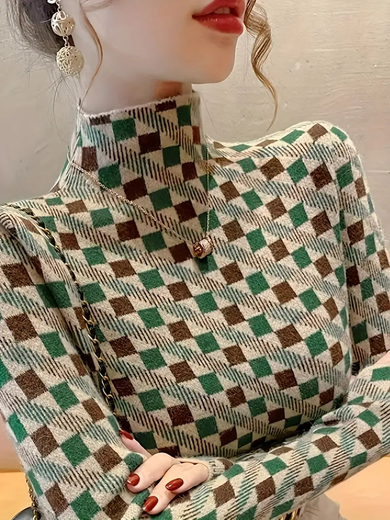 Capri sweater met geometrisch patroon – een stijlvolle en comfortabele must-have voor koelere dagen. Met een knusse turtleneck en levendige kleuren in groen, oranje en rood biedt deze trui warmte en een trendy uitstraling. Perfect voor casual uitjes, gezellige bijeenkomsten of om kleur toe te voegen aan je dagelijkse look. Combineer moeiteloos met jeans, rokken of broeken. Verkrijgbaar in maten S-XL. Voeg levendigheid en comfort toe aan je garderobe met de Capri. Bestel nu!