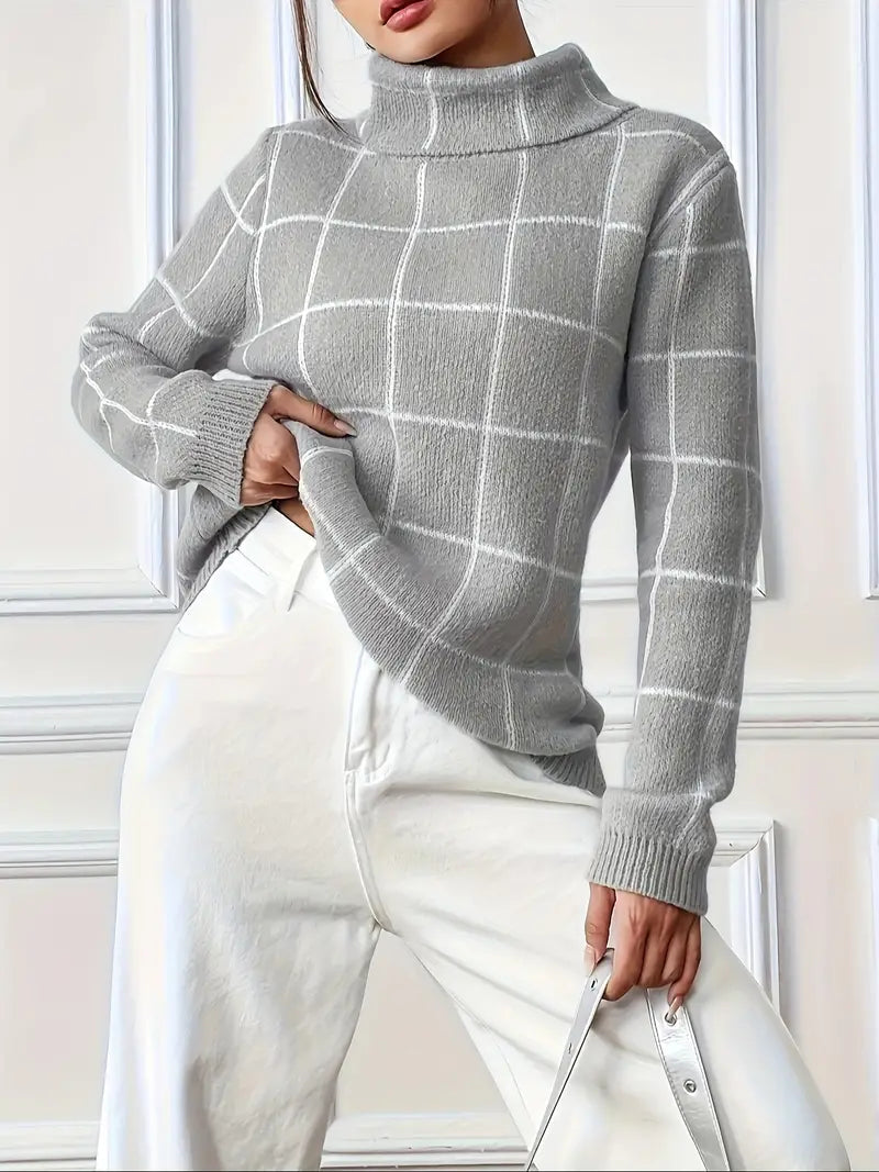 Stijlvolle Elody trui met klassiek ruitpatroon en chique colkraag. Verkrijgbaar in zachte tinten grijs, abrikoos en paars. Perfect voor casual dagen, kantooruren of knusse avonden thuis. Ontspannen pasvorm voor ultiem comfort en tijdloze elegantie. Ideaal voor de koudere maanden, eenvoudig te combineren met jeans of rokken. Voeg deze veelzijdige must-have toe aan je garderobe en geniet van stijlvolle warmte en moderne charme. Bestel nu voor cozy en modieuze looks!