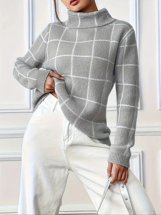 Stijlvolle Elody trui met klassiek ruitpatroon en chique colkraag. Verkrijgbaar in zachte tinten grijs, abrikoos en paars. Perfect voor casual dagen, kantooruren of knusse avonden thuis. Ontspannen pasvorm voor ultiem comfort en tijdloze elegantie. Ideaal voor de koudere maanden, eenvoudig te combineren met jeans of rokken. Voeg deze veelzijdige must-have toe aan je garderobe en geniet van stijlvolle warmte en moderne charme. Bestel nu voor cozy en modieuze looks!