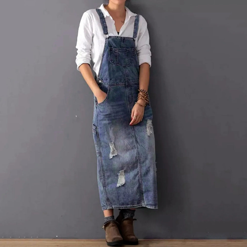 Ervaar moeiteloze stijl met de Eslem jurk, een casual-chique outfit met smalle bandjes en een klassieke denimlook. Gemaakt van een zachte en duurzame mix van katoen en polyester, biedt deze jurk comfort voor dagelijks gebruik. Verkrijgbaar in grijs, in de maten XS tot 2XL. Perfect voor casual uitstapjes, ontspannen weekenden of als laagje over een T-shirt. Upgrade je garderobe met de veelzijdige Eslem jurk voor een moderne en elegante uitstraling.