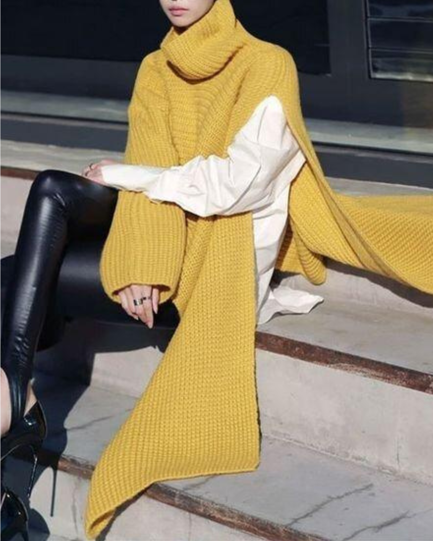 Ervaar verfijning met de Malina, een asymmetrische top die comfort en stijl biedt voor koude dagen. Ideaal voor casual uitjes, frisse avonden of als laagje over je favoriete outfits. Verkrijgbaar in Geel en Baksteen Rood, maten S-4XL. Combineer warmte en veelzijdigheid in één elegant kledingstuk. Bestel de Malina vandaag en voeg een unieke flair toe aan je garderobe!