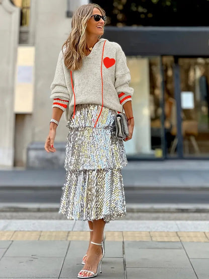 Marinth trui: een combinatie van speelse stijl en comfort. Met een charmant hartdetail, levendige accenten en een warme abrikooskleur geeft het een vrolijke touch aan je casual outfit. Perfect voor uitjes, gezellige momenten of knusse dagen thuis. Zachte, comfortabele pasvorm en ideaal voor koelere dagen. Verkrijgbaar in abrikoos, maten S-2XL. Voeg charme en persoonlijkheid toe aan je garderobe met Marinth. Bestel nu en geniet van stijl en warmte!