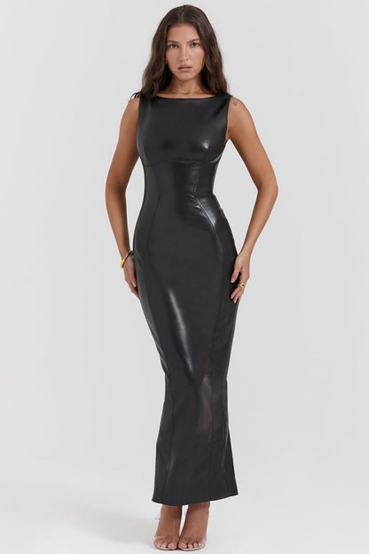 Iliara elegante bodycon jurk met een strakke pasvorm en een verfijnde vierkante halslijn. Gemaakt van een luxe mix van katoen, polyester en leer voor comfort en duurzaamheid. Perfect voor avondjes uit, formele gelegenheden en stijlvolle evenementen. De tijdloze zwarte kleur en flatterende snit zorgen voor een krachtige en elegante uitstraling. Verkrijgbaar in maten S-XL. Bestel nu en straal zelfvertrouwen en klasse uit bij elke gelegenheid!